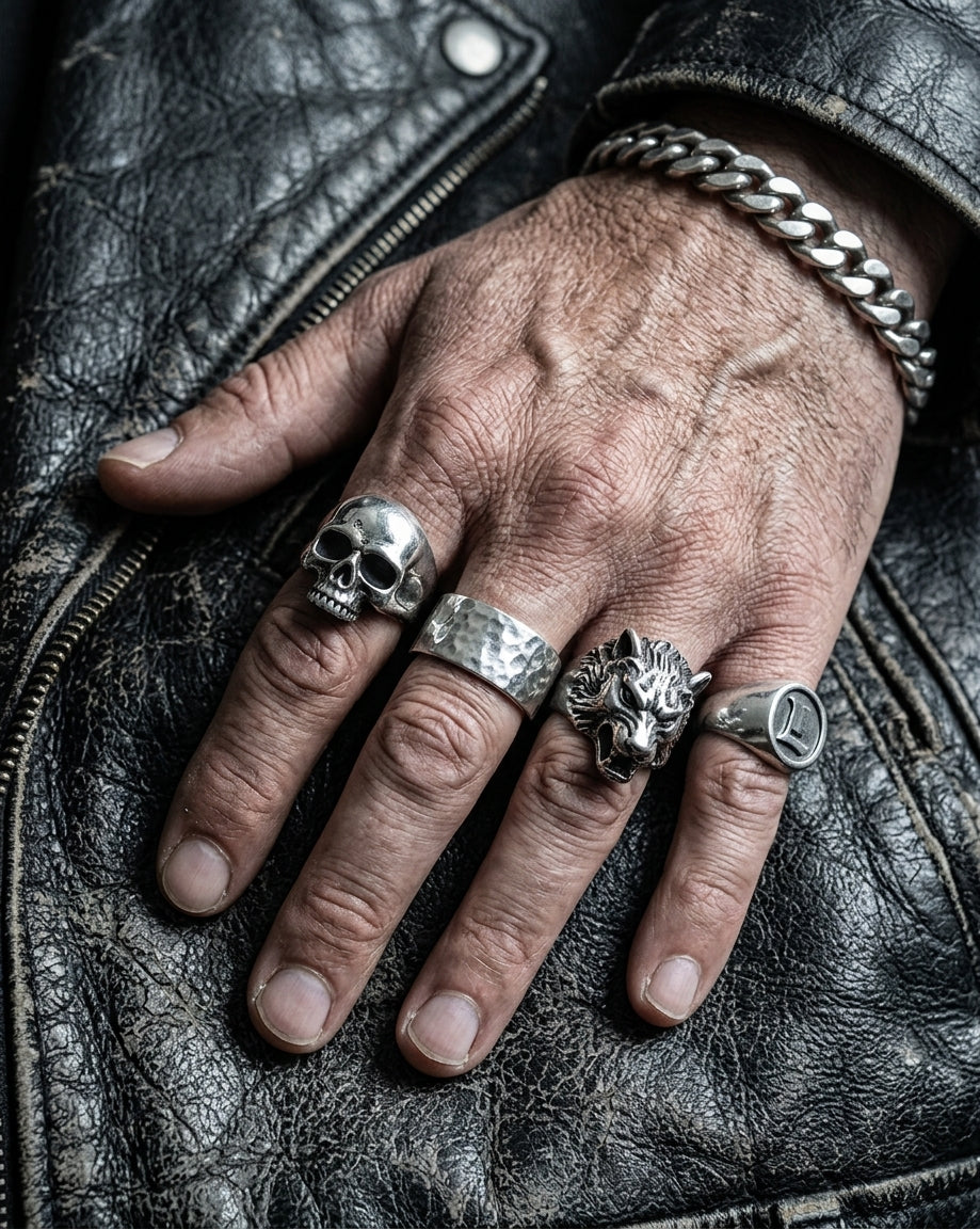 Hand wearing stacked stainless steel rings