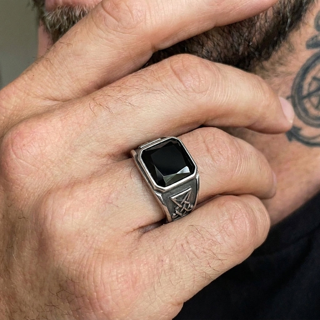 Signet Ring with Black Gemstone and Engraved Symbol