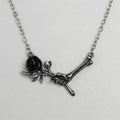 Bone Hand Cursed Rose Necklace