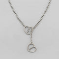 Ketting met curb-schakels, gebroken hartenring en lariat-hanger
