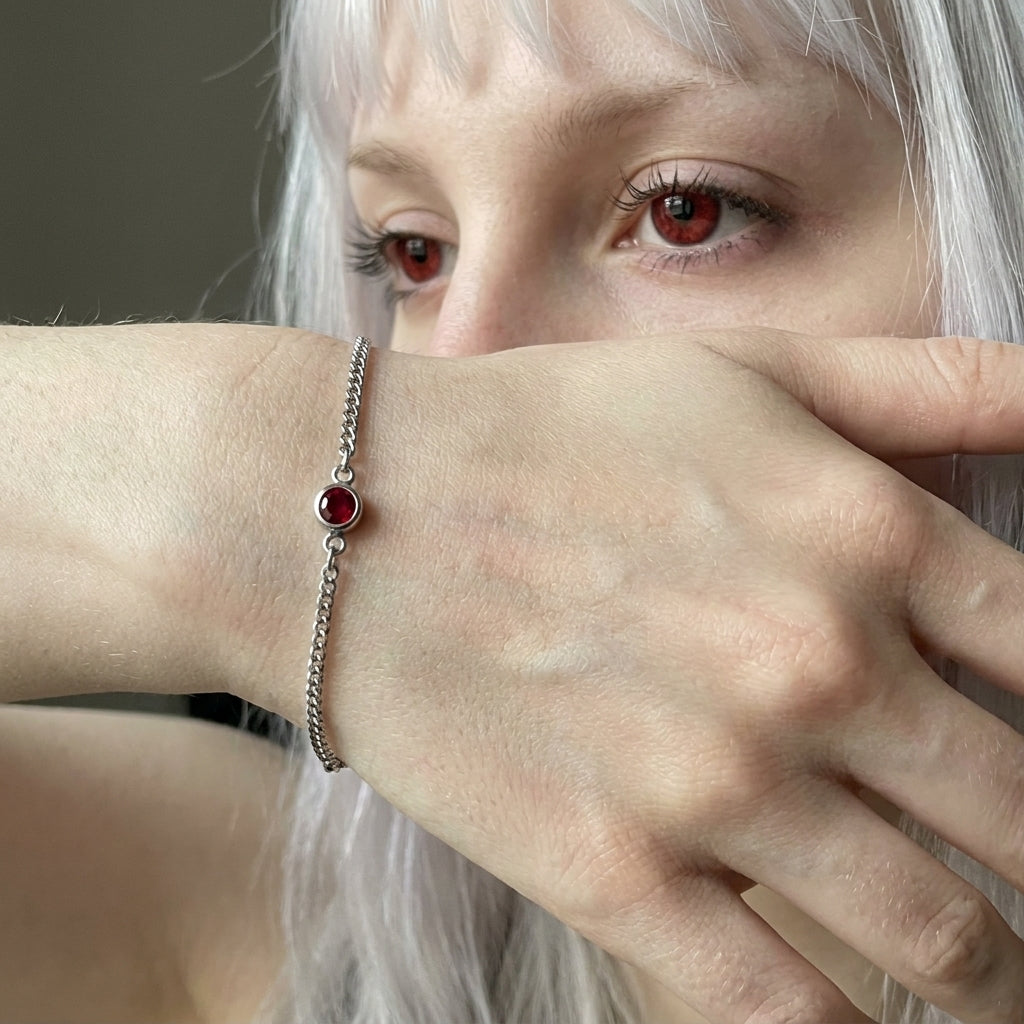 Ruby Solitaire Silver Curb Chain Bracelet