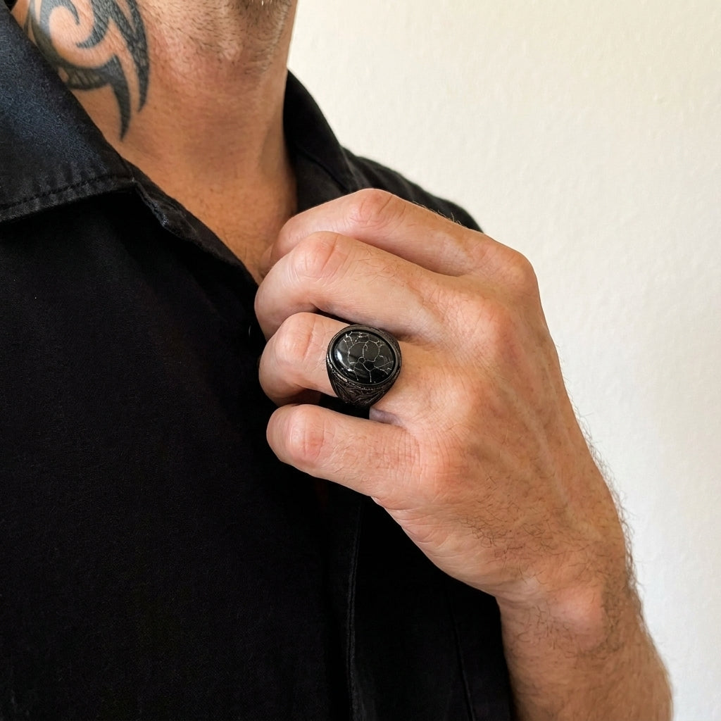 Siegelring mit schwarzem Marmor und ovalem Cabochon