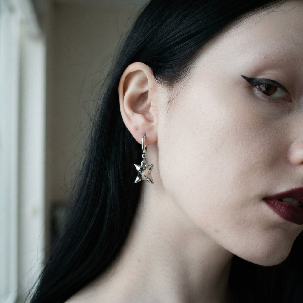 Spiked Orb Star Huggie Earrings