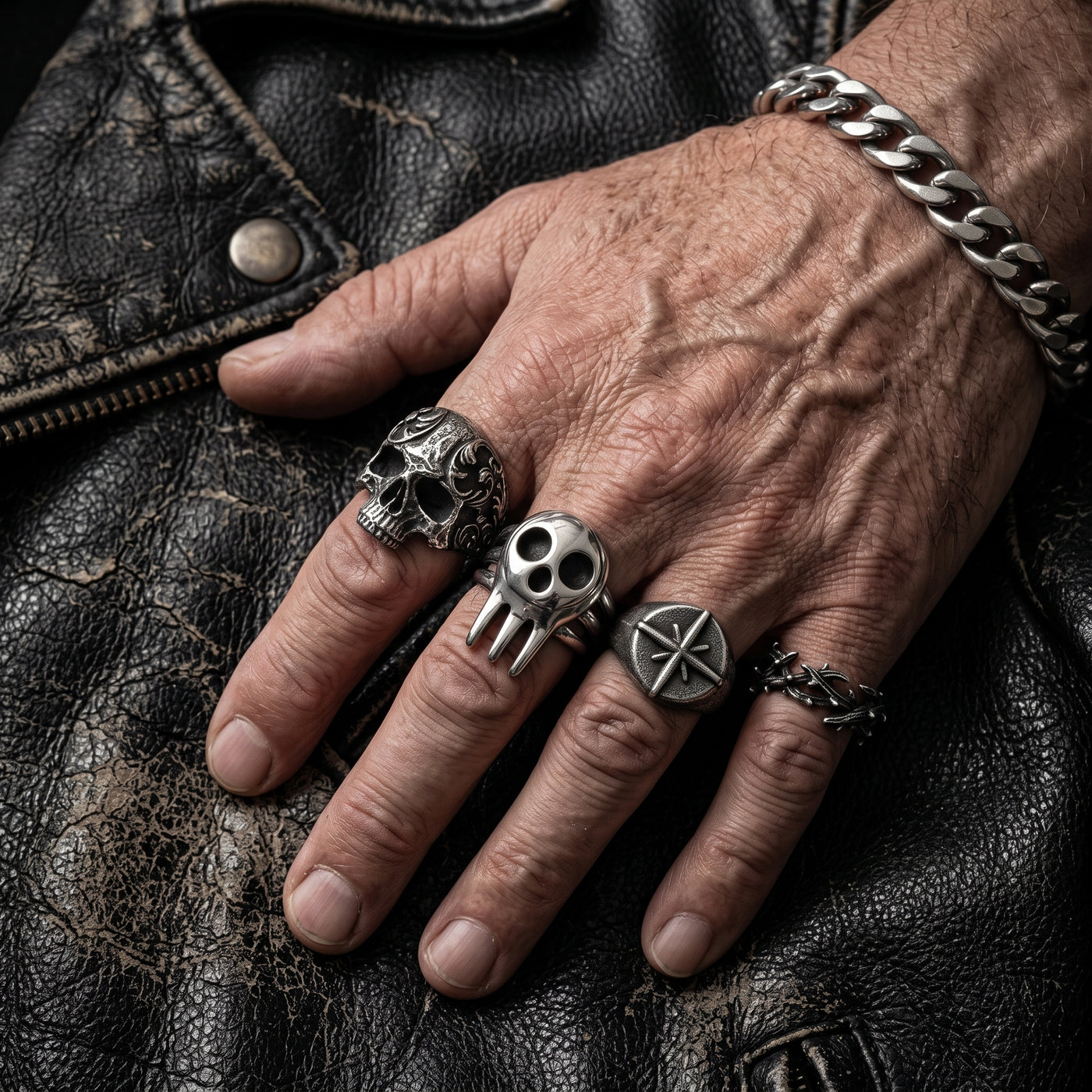 Hand wearing stacked stainless steel rings