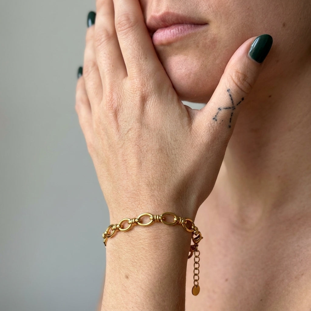 Gold Knotted Oval Link Chain Bracelet