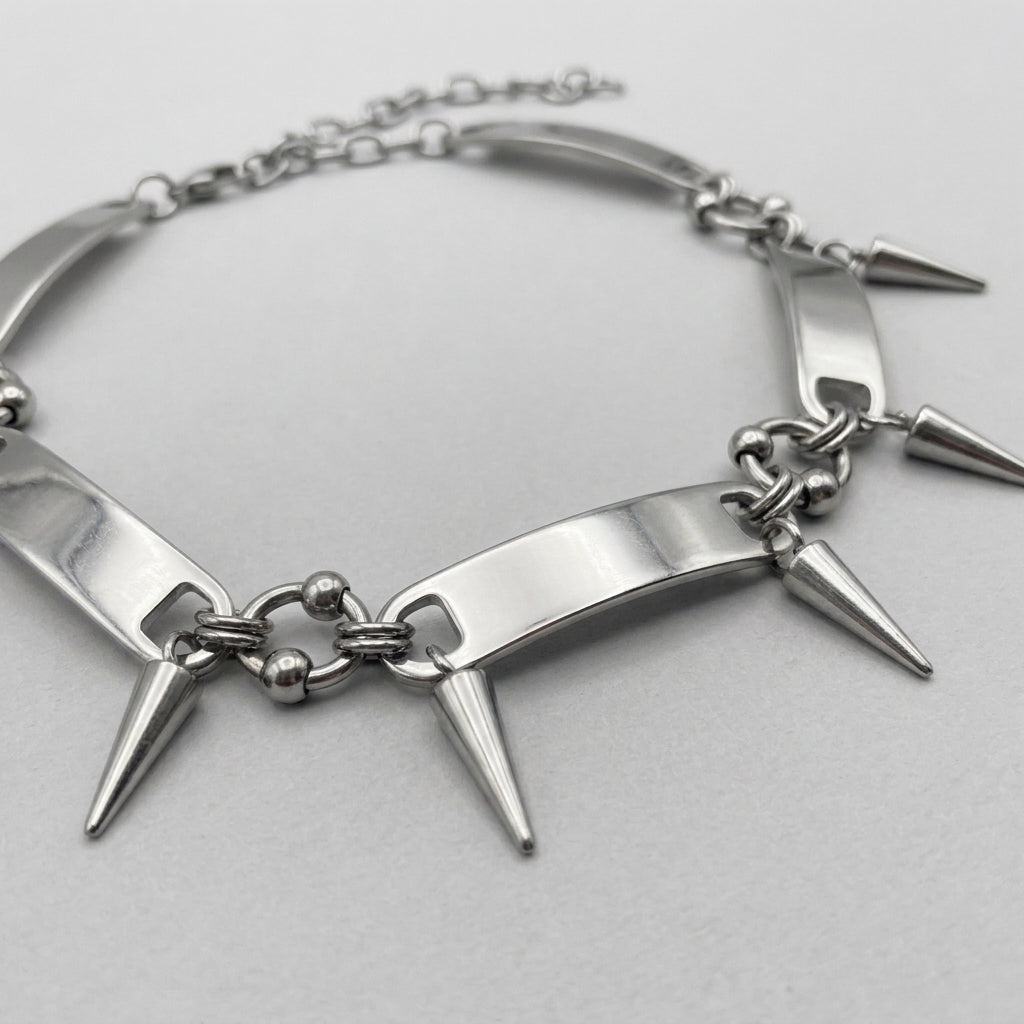 Chokerketting met spiegelstaafjes en hangende punten