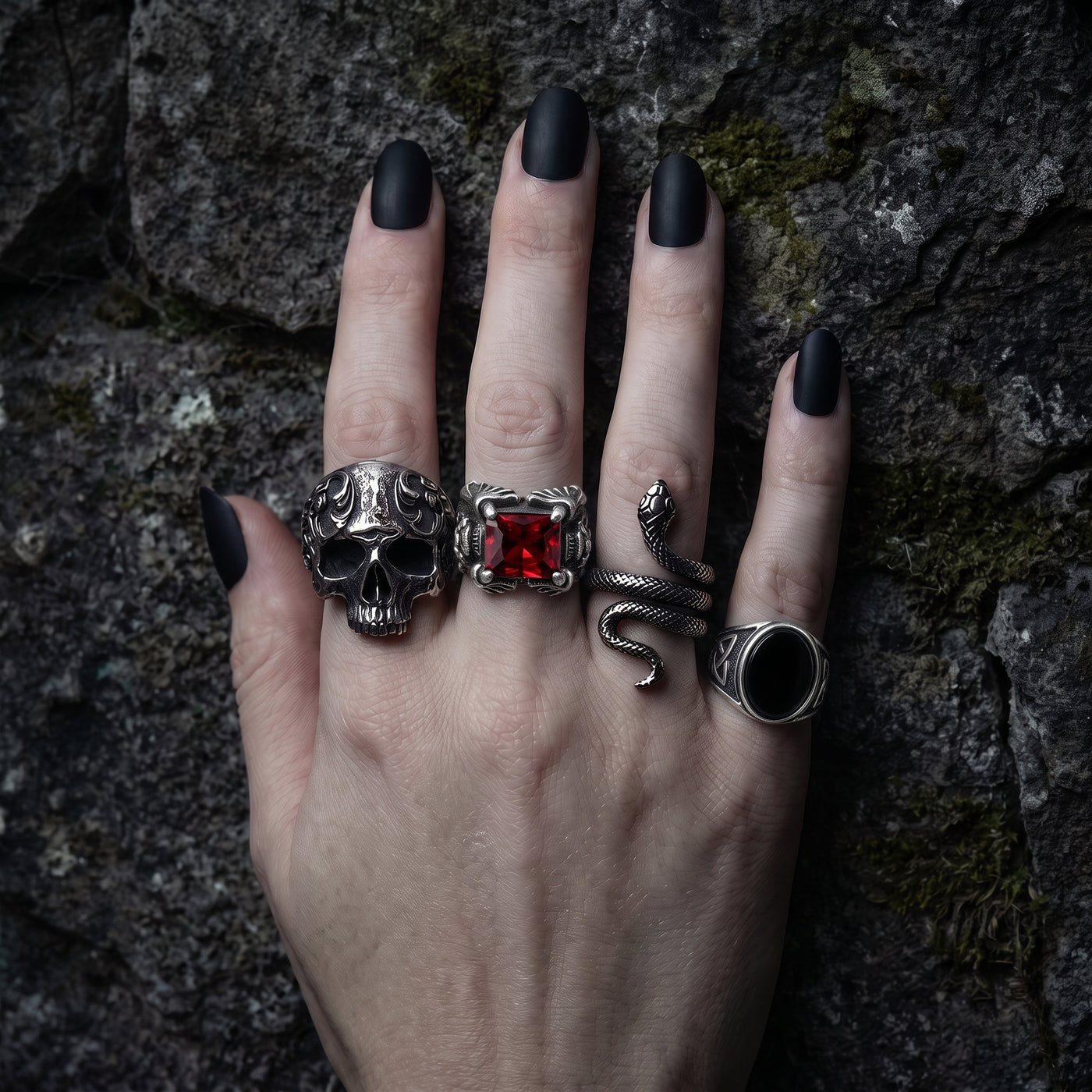 Hand wearing stacked stainless steel rings