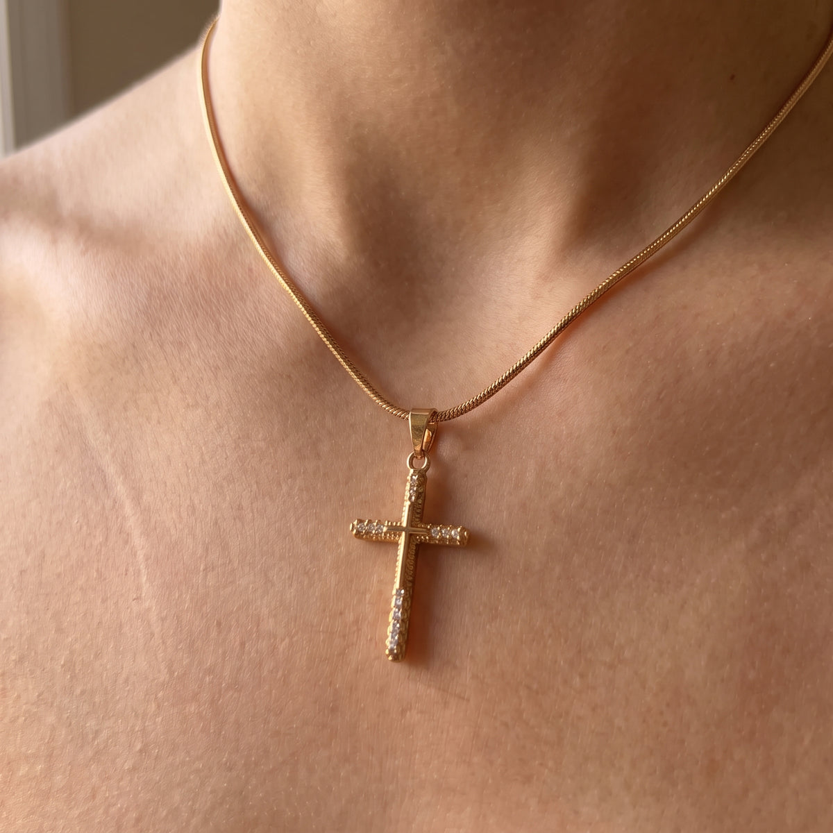 Gold Crystal-Tipped Ribbed Cross Snake Chain Necklace