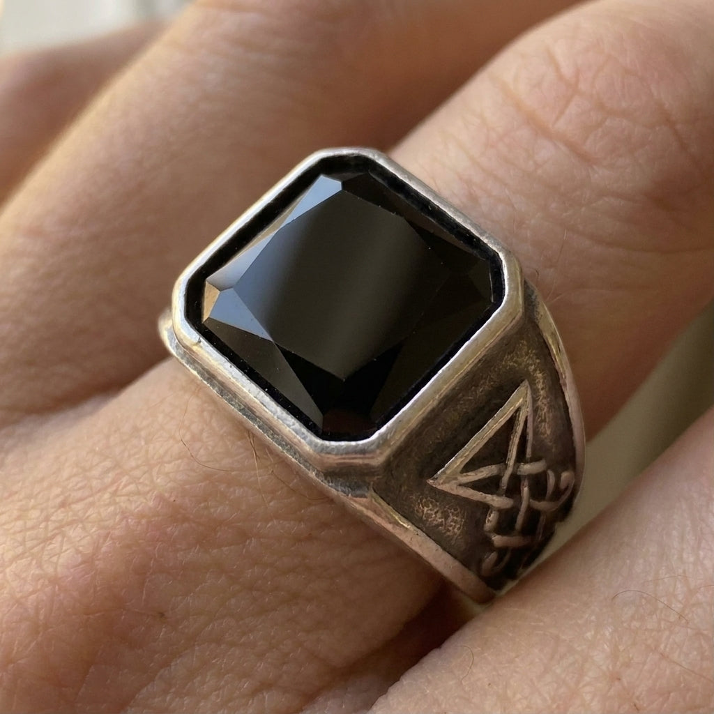 Signet Ring with Black Gemstone and Engraved Symbol