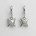 Spiked Orb Star Huggie Earrings