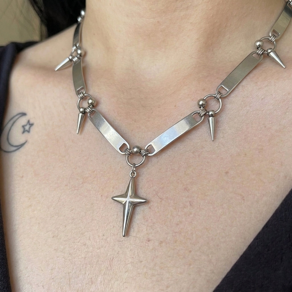 Ketting met sterhanger en staaf met spikes