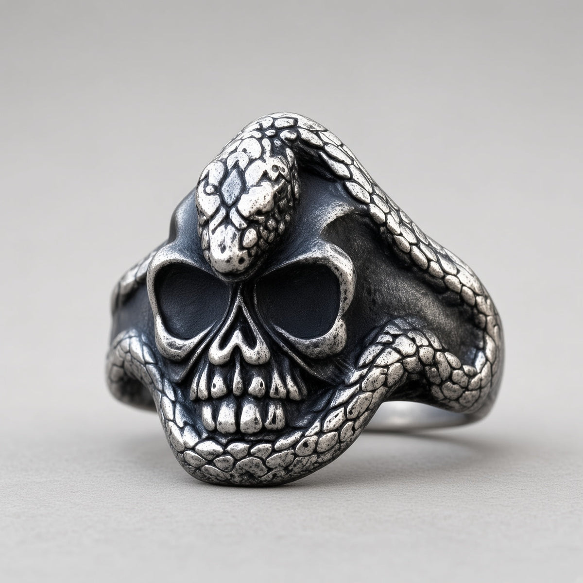 Serpent-Wrapped Skull Ring
