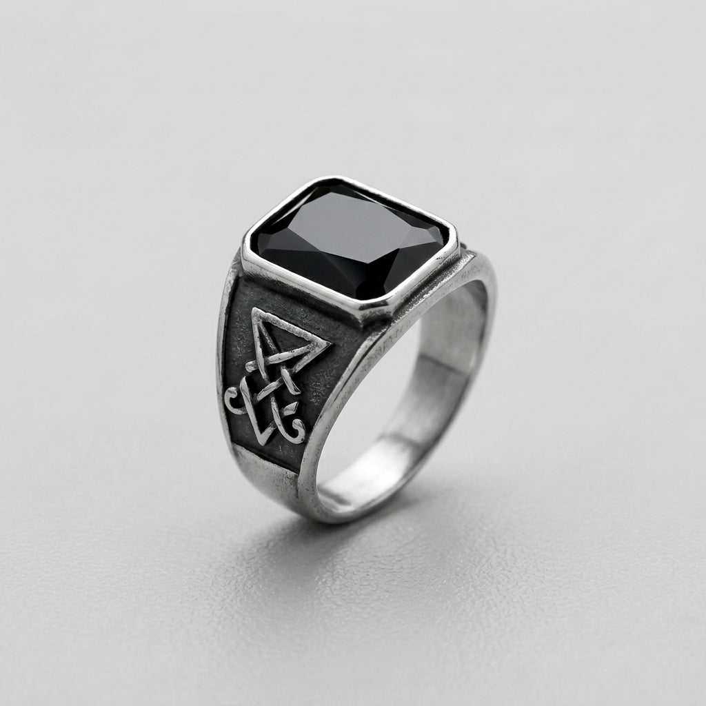 Signet Ring with Black Gemstone and Engraved Symbol