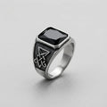 Signet Ring with Black Gemstone and Engraved Symbol