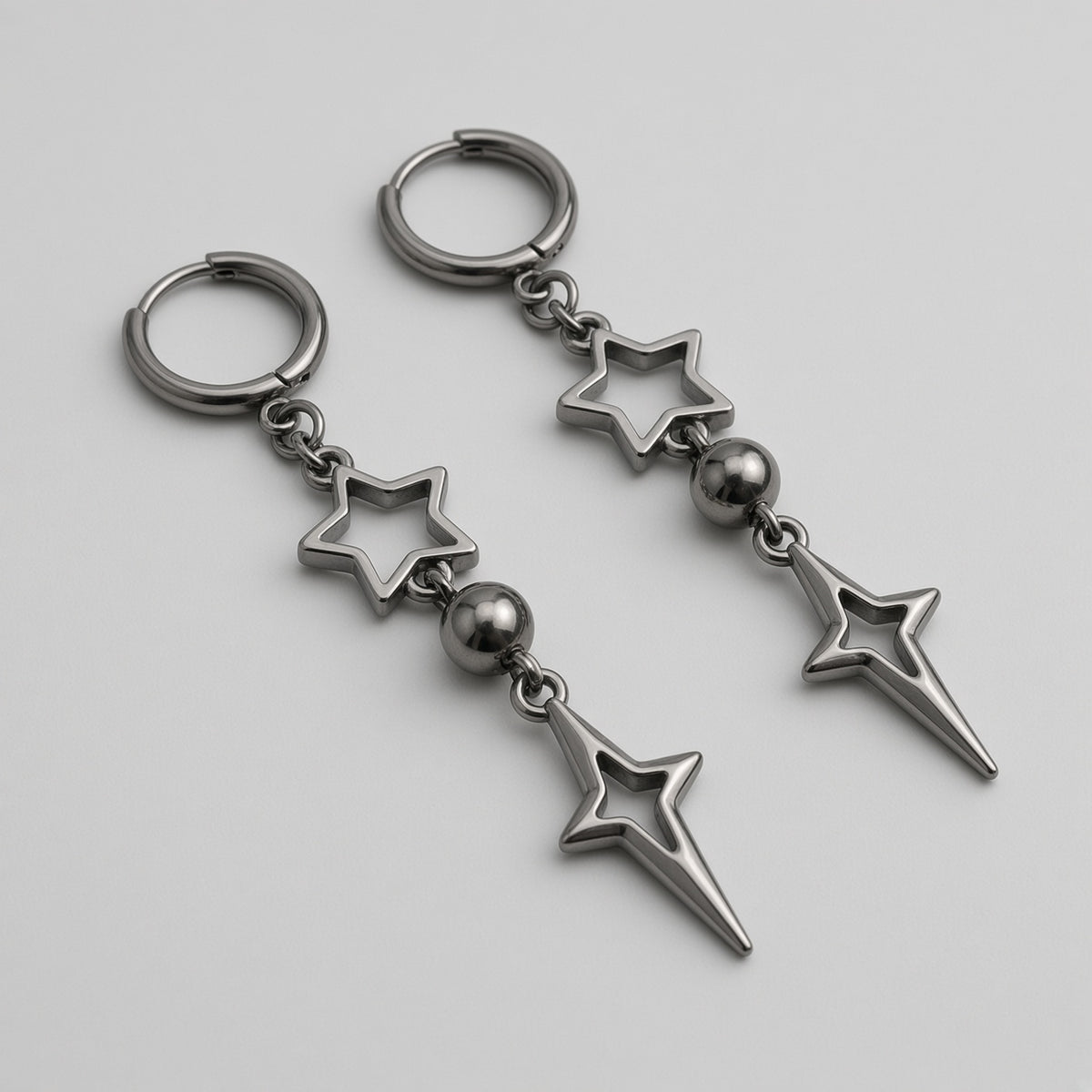 Gunmetal Star & North Star Drop Earrings