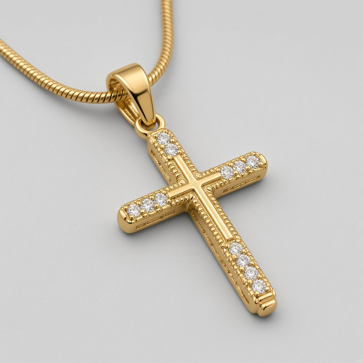 Gold Crystal-Tipped Ribbed Cross Snake Chain Necklace