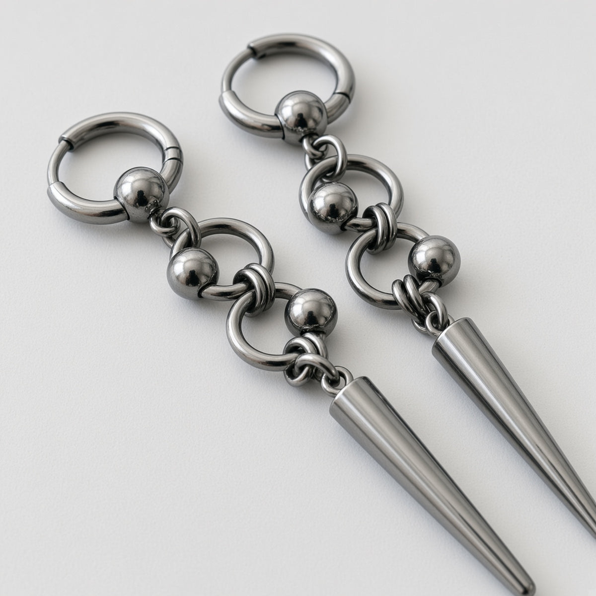 Gunmetal Orbit Bead Long Spike Earrings