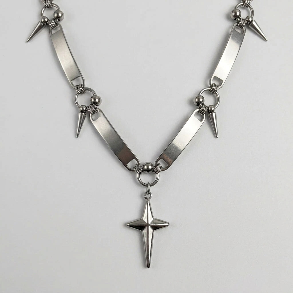 Ketting met sterhanger en staaf met spikes